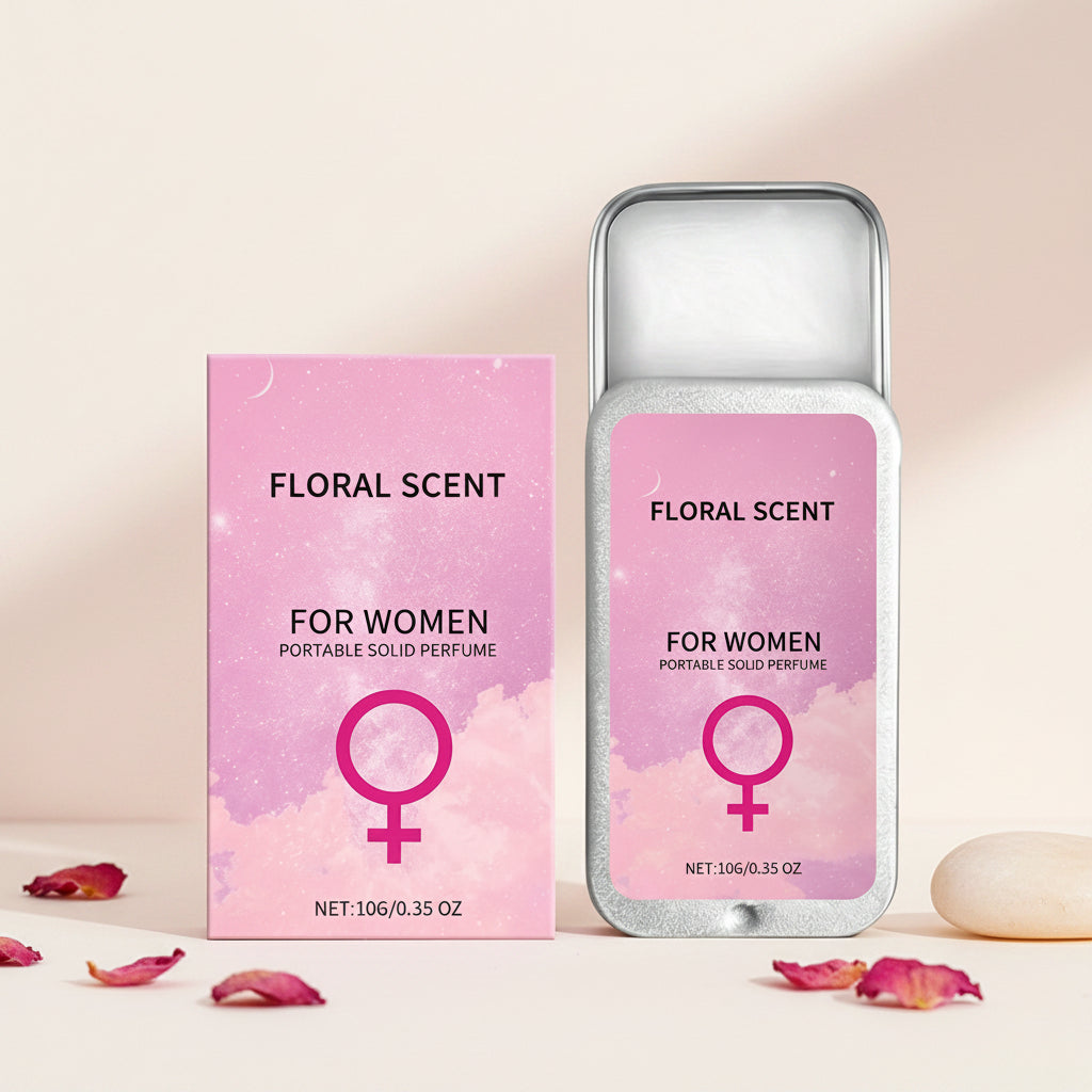 Portable floral solid perfume balm in a compact metal tin.
